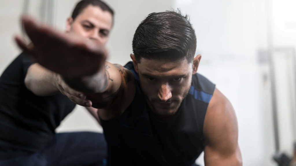 athlete attending a physical therapy session