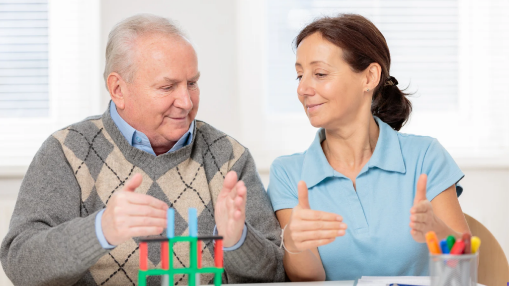 old man with cognitive impairment with occupational therapist