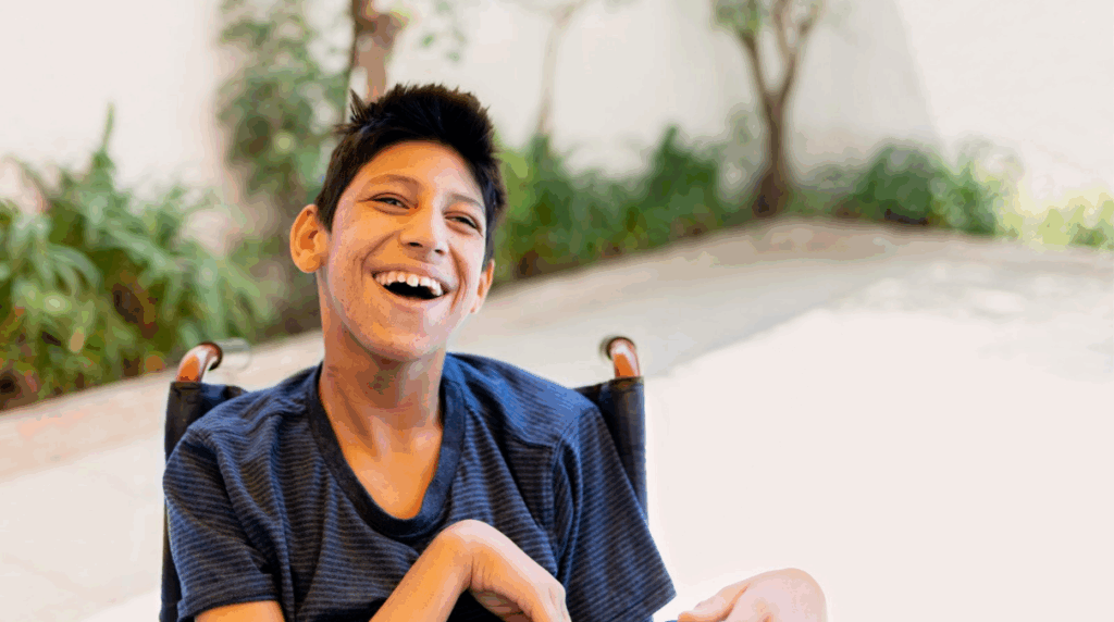 man with cerebral palsy giving his best smile