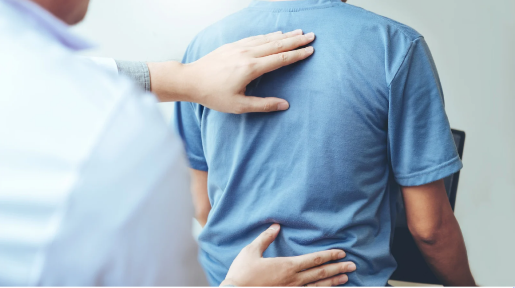 man on a physical therapy session